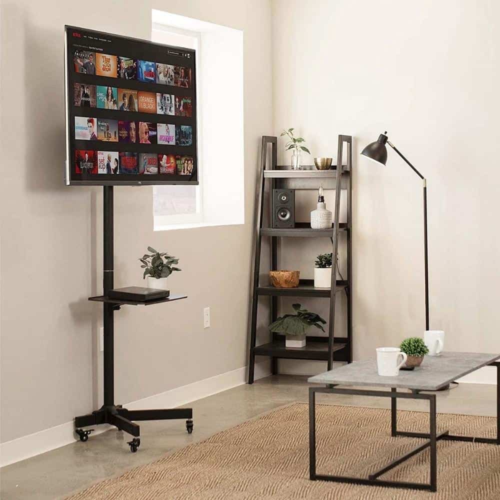 Vivo STAND-TV04M mobile TV stand on a living room