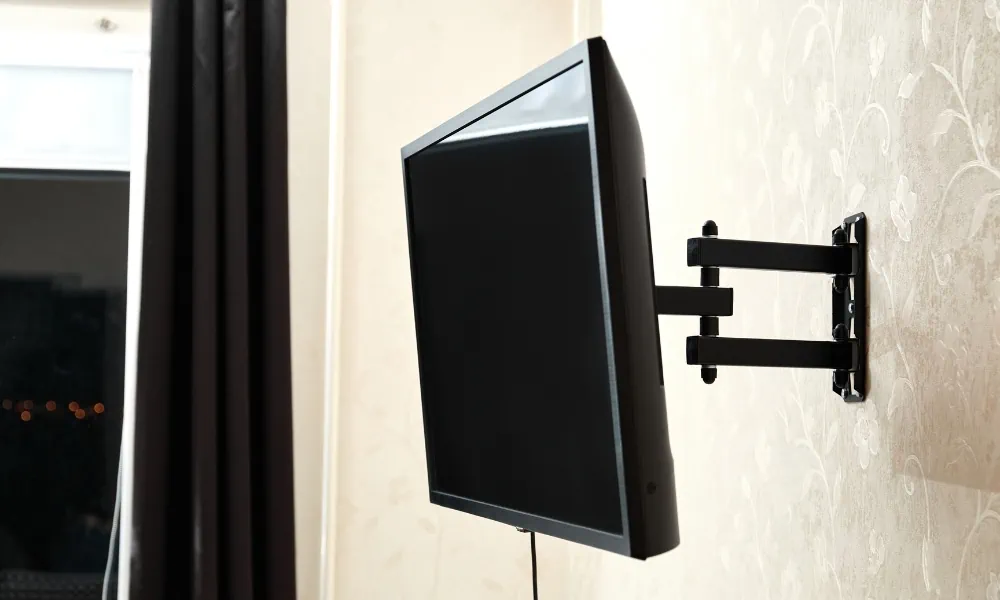 Installed single-arm extendable TV mount on the wall
