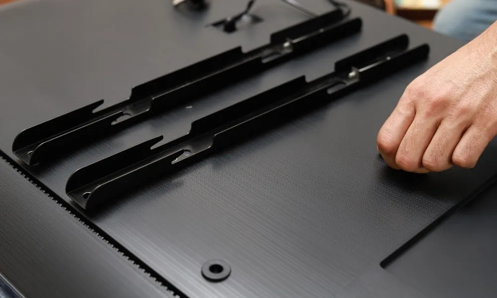 Attaching TV bracket from the back of the TV