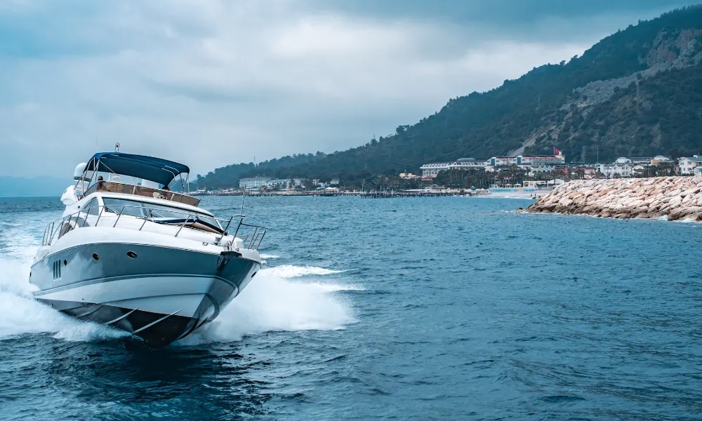 Yacht challenging the waves of saltwater