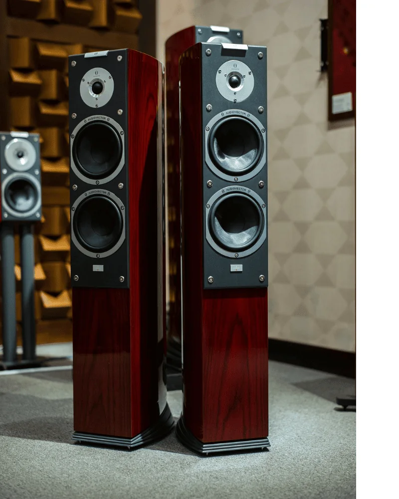 Floor speakers in a home speaker system