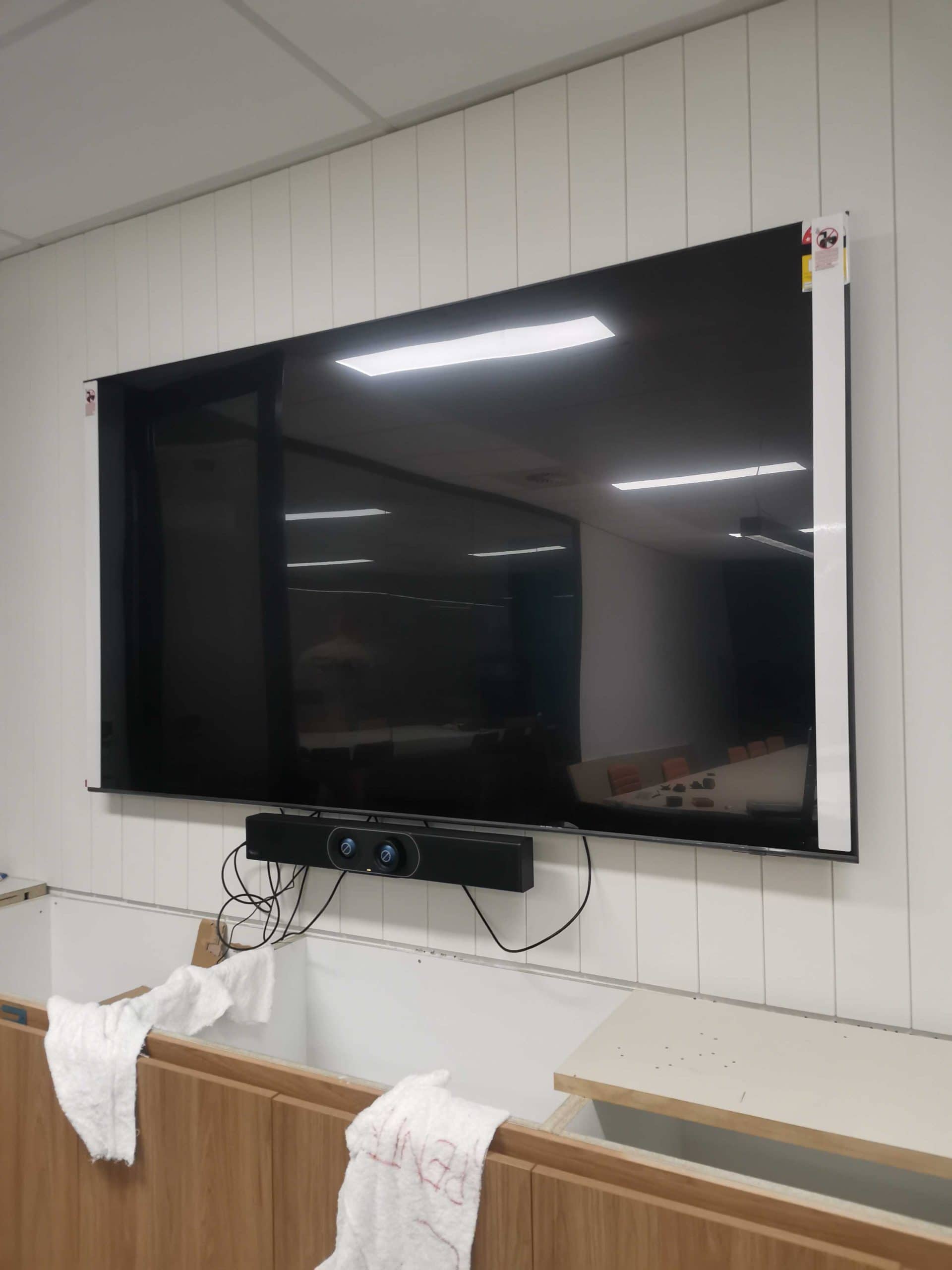 Soundbar installed under TV