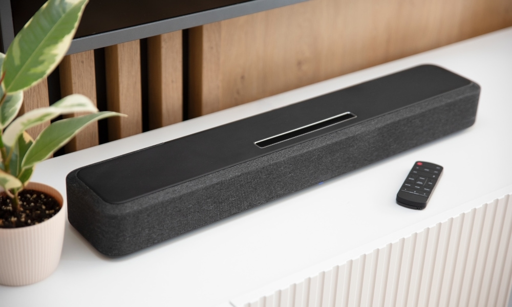 Soundbar and a remote control over a tabletop