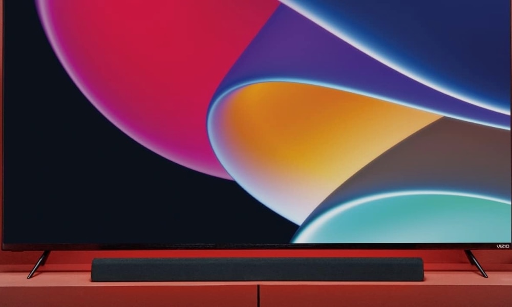 Vizio M-Series M213ad-K8 above a table